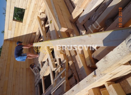 Дом по индивидуальному проекту из обрезного бруса 150х150 мм