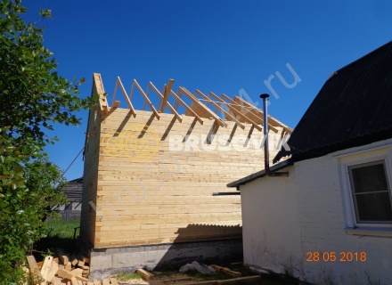Дом по индивидуальному проекту из обрезного бруса 150х150 мм