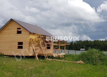 Дом из профилированного бруса 145х145 мм по индивидуальному проекту