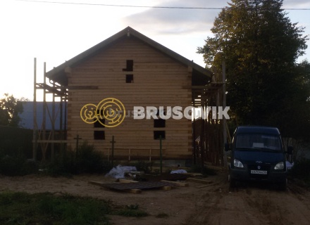 Дом 7х13 м с беседкой из обрезного бруса 150х200 мм в Московской области
