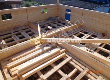 Дом по индивидуальному проекту из обрезного бруса 150х150 мм