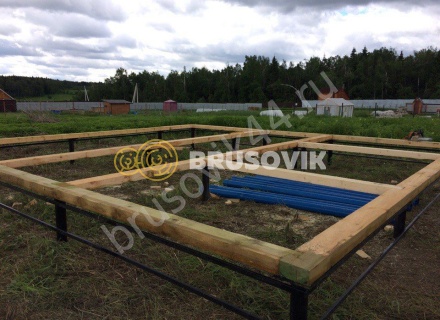 Деревянный дом из бруса с мансардой